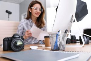 Professional photographer with modern camera
