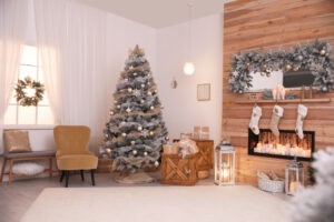 Festive interior with beautiful Christmas tree and gifts